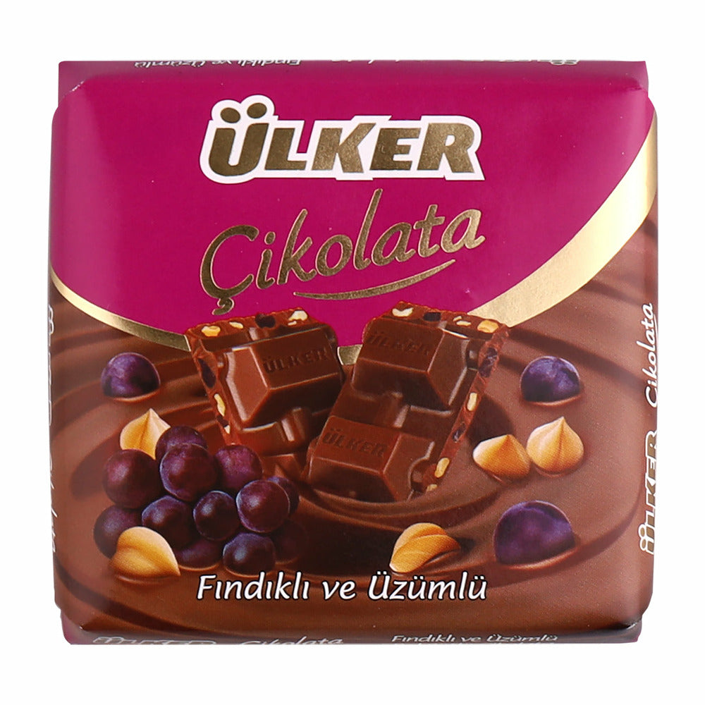 Ulker Extra Milk Chocolate With Hazelnut and Raisins 65 gr_630769546c93d.jpeg Ulker Extra Milk Chocolate With Hazelnut and Raisins 65 gr - Image 1